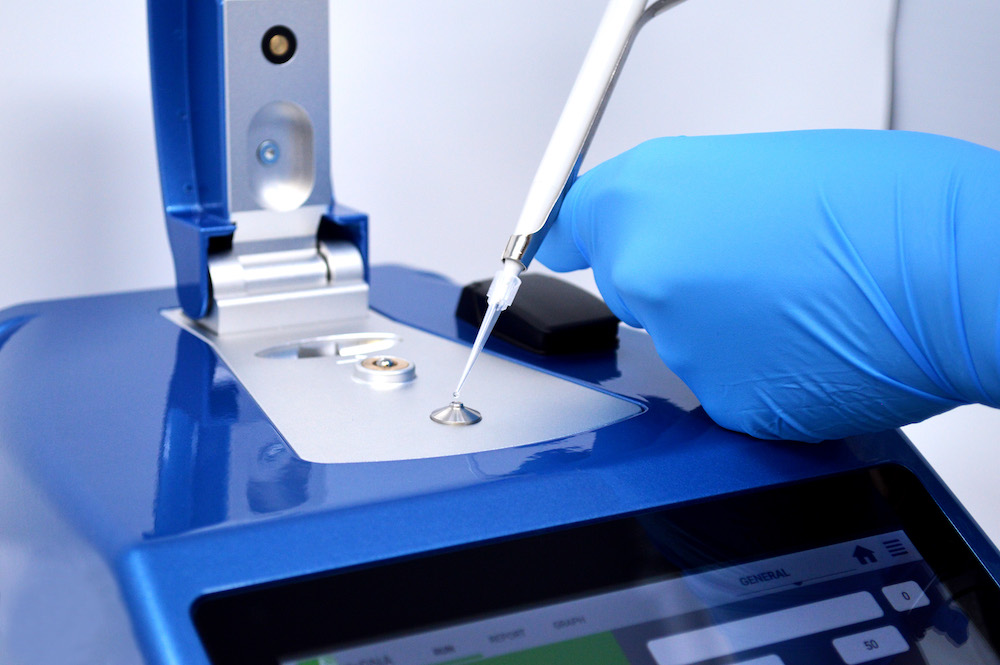 A 1 uL sample is pipetted onto a Nano UV-Vis Spectrophotometer, the DeNovix DS-11 FX+.