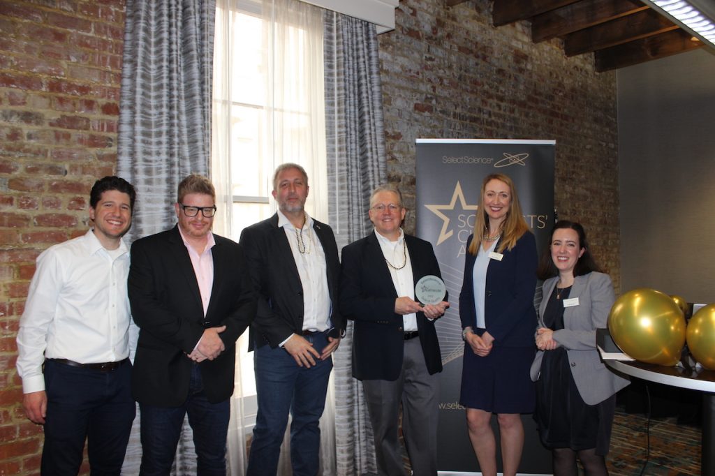 DeNovix team receiving the 2022 Customer Service Company of the Year Award from SelectScience